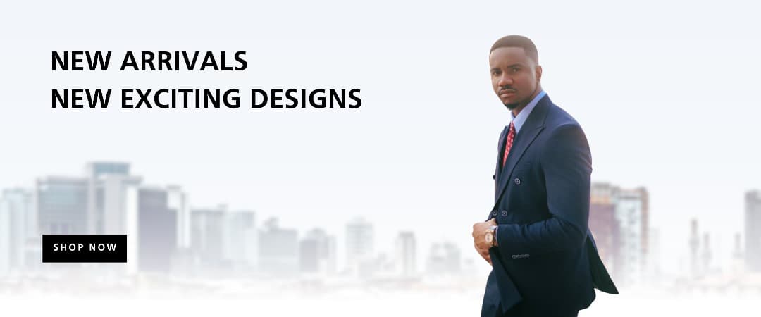 A woman showcasing formal suits at a clothing store