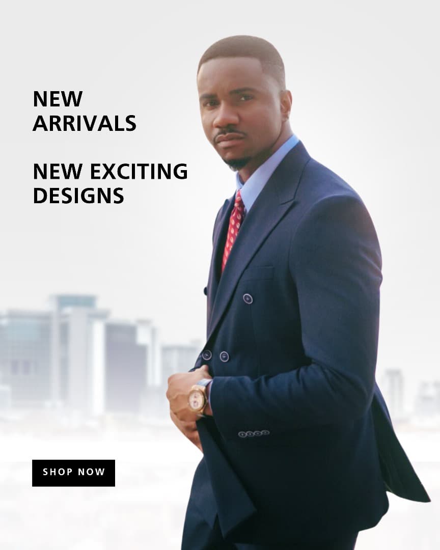 A woman showcasing formal suits at a clothing store